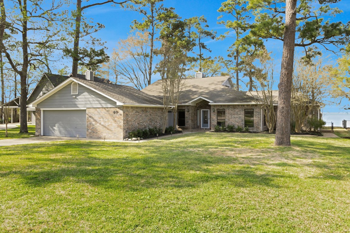 Welcome to 40 Pebble Beach Circle - a waterfront home in the gated community of Cape Royale on Lake Livingston