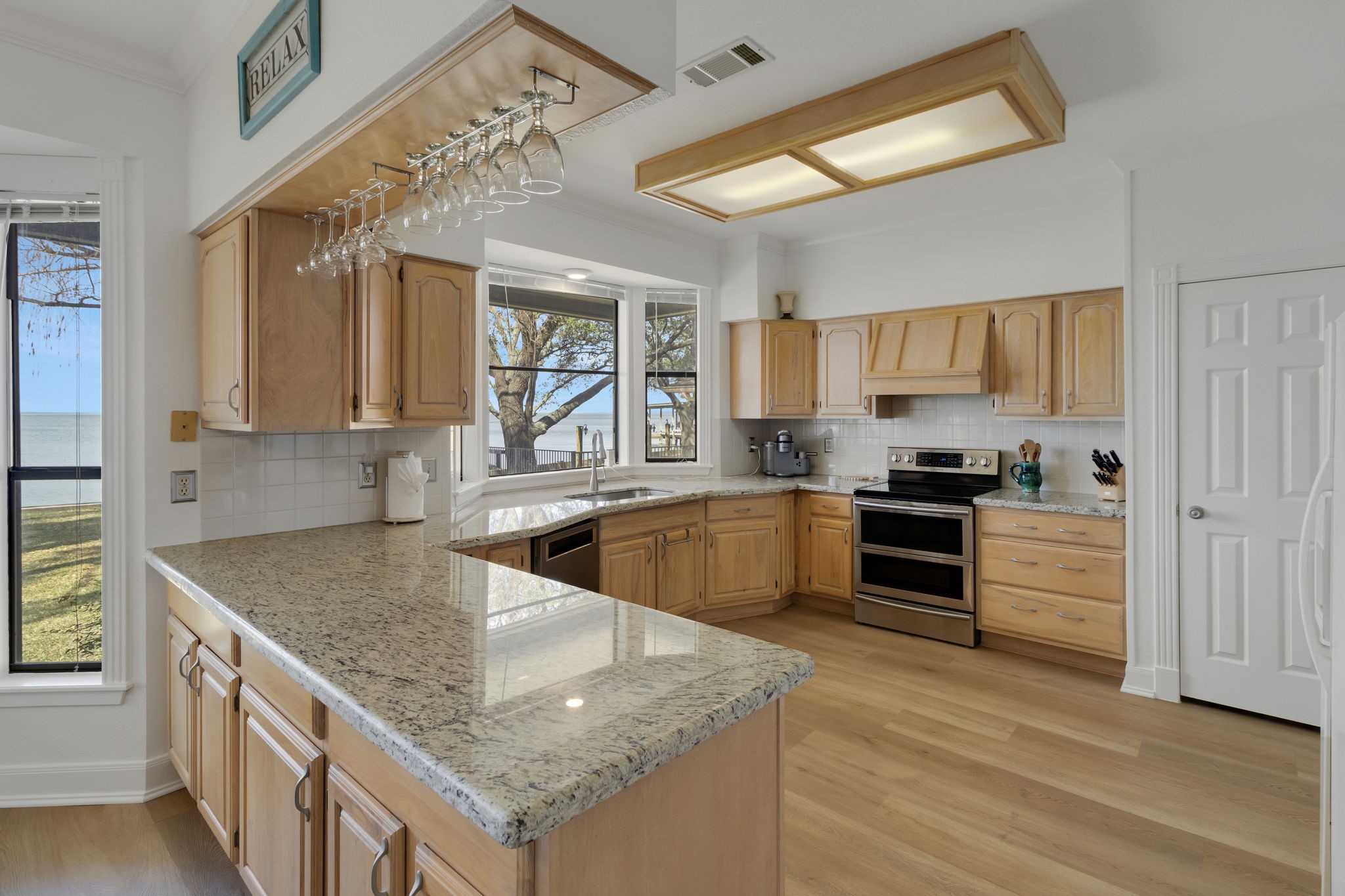 40 Pebble Beach Circle Coldspring, TX 77331 - Photo 14 of 50 The kitchen features granite countertops, lots of storage and pantry