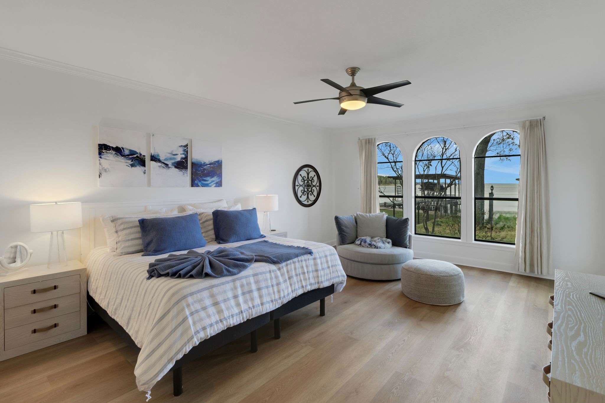 40 Pebble Beach Circle Coldspring, TX 77331 - Photo 22 of 50 The primary bedroom is on the first floor and overlooks the lake
