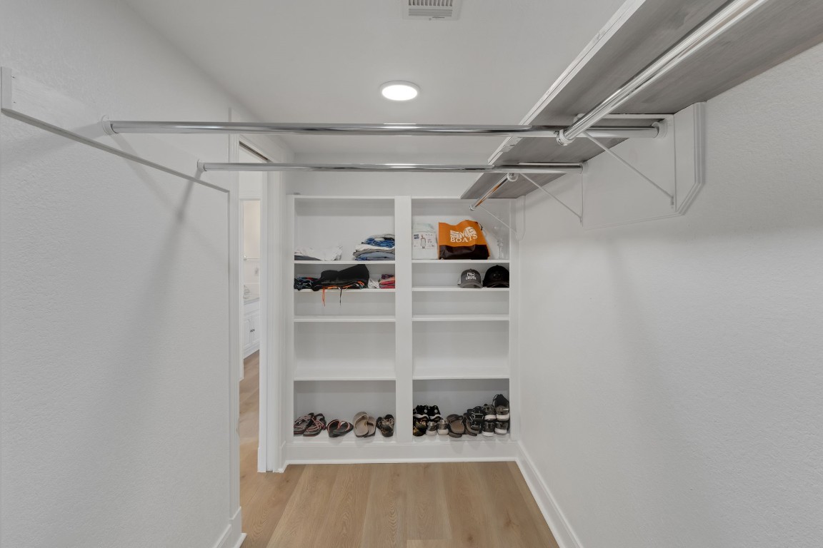 40 Pebble Beach Circle Coldspring, TX 77331 - Photo 27 of 50 Walk in primary closet with built in shelving