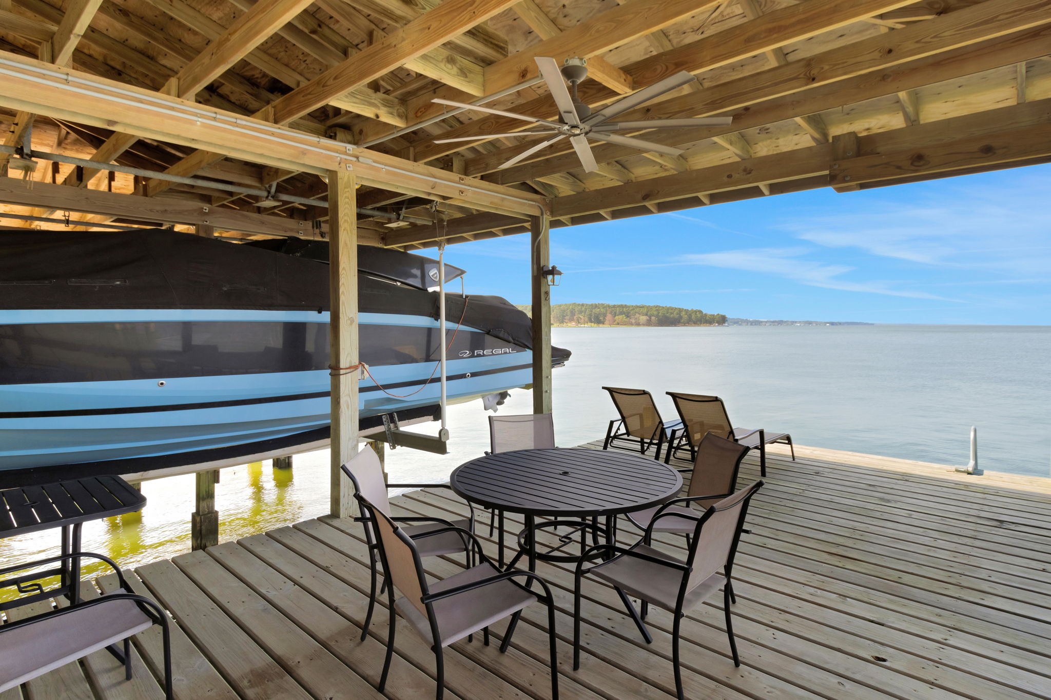 40 Pebble Beach Circle Coldspring, TX 77331 - Photo 38 of 50 Enjoy that lake breeze from the covered seating area on the boathouse