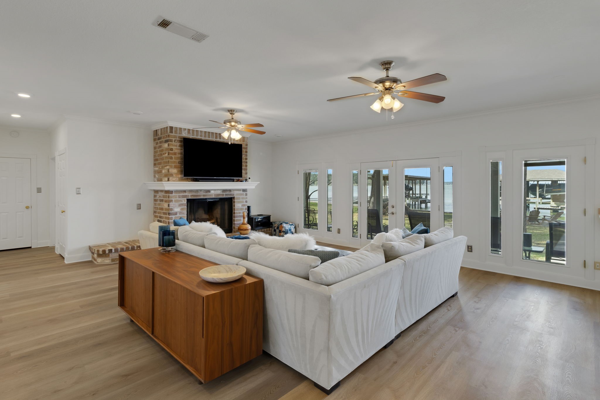 40 Pebble Beach Circle Coldspring, TX 77331 - Photo 7 of 50 Recently installed luxury vinyl plank flooring runs throughout the downstairs living areas - durable, stylish and perfect for lake life
