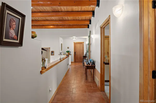 a view of a hallway with a couch