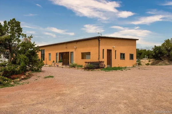 front view of a house with a patio