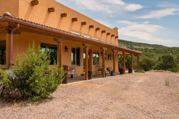 a front view of a building with an outdoor space