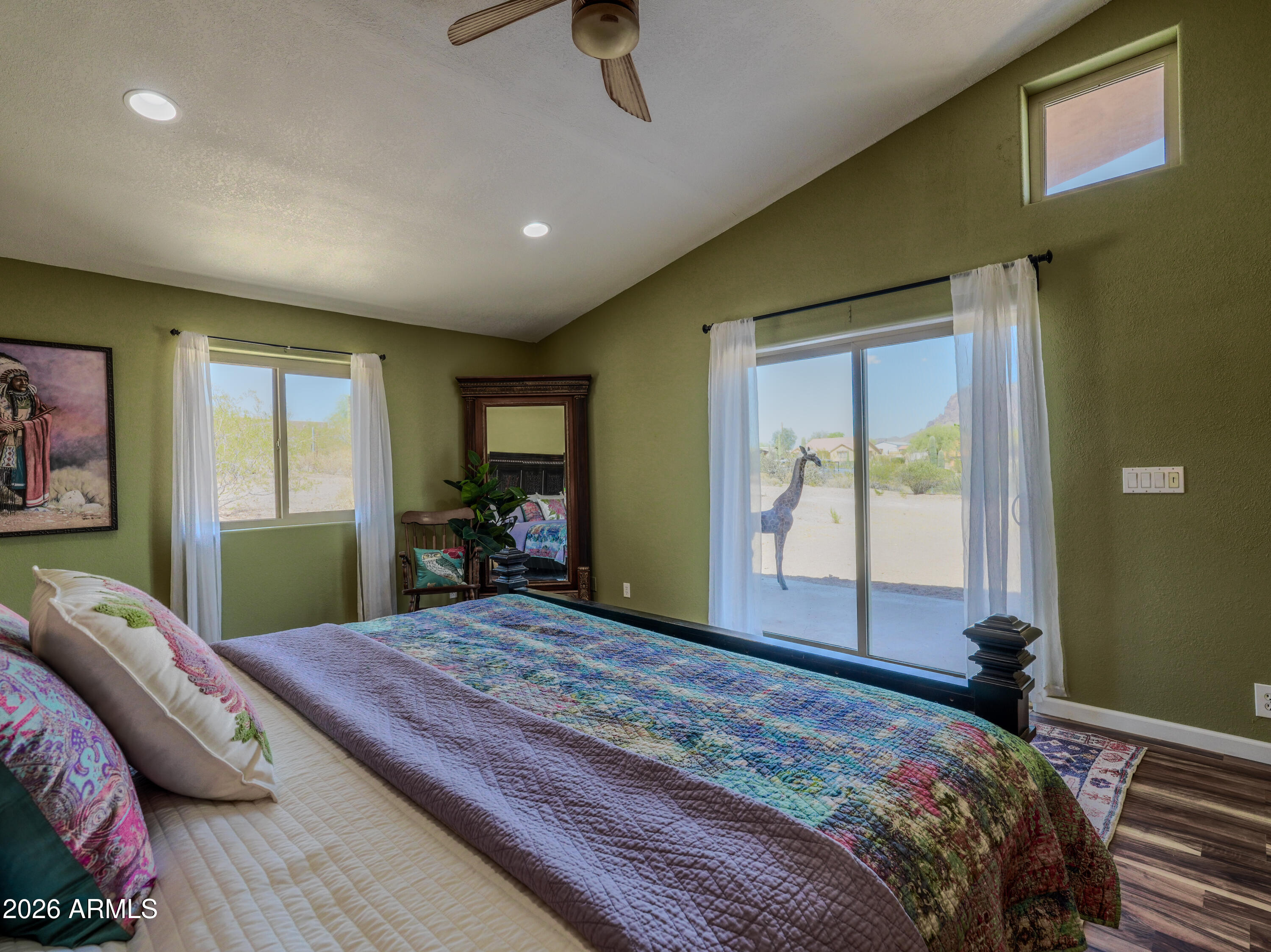 1224 North Acacia Road Apache Junction, AZ 85119 - Photo 20 of 48 a bedroom with a large bed and a large window