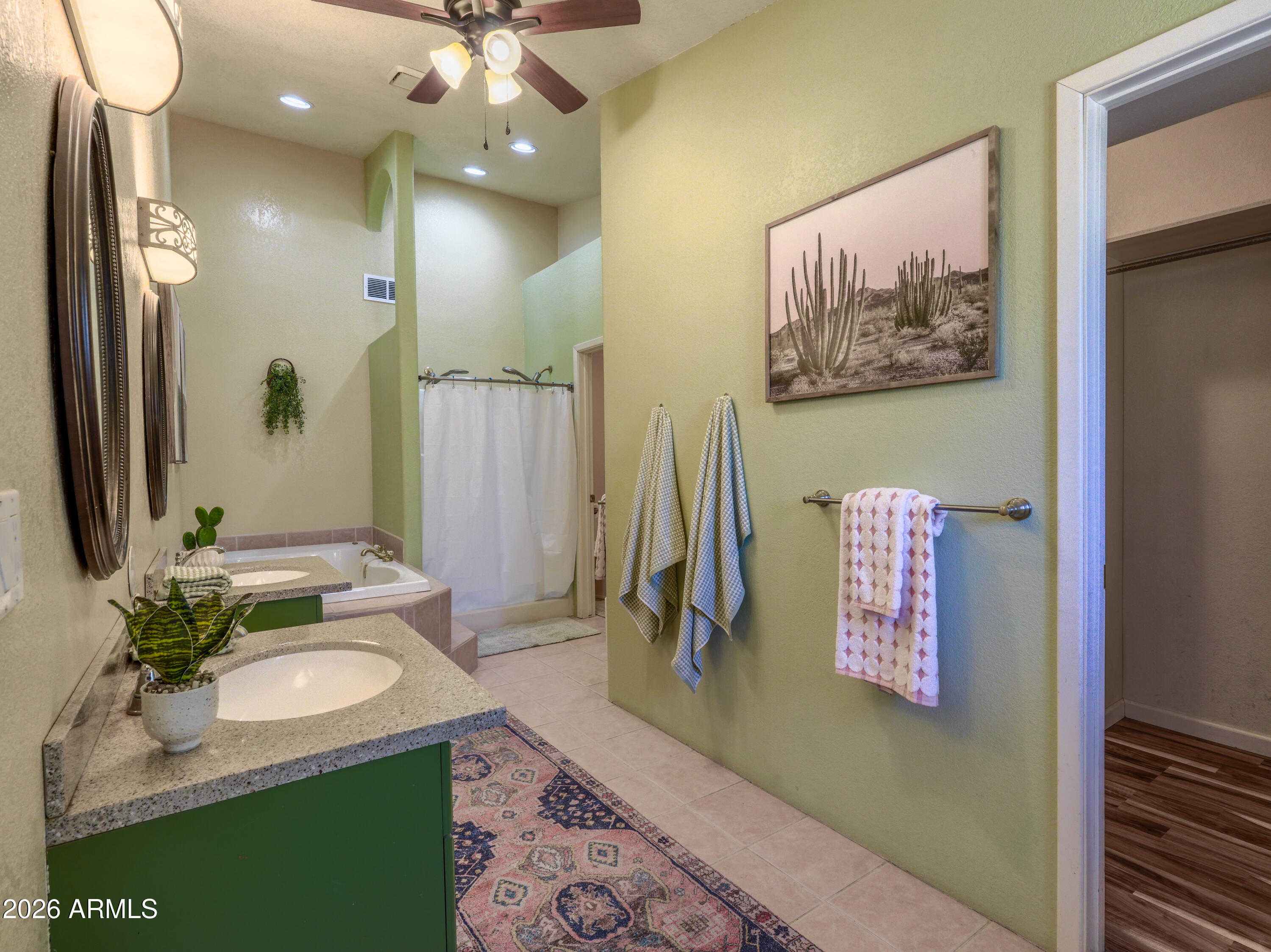 1224 North Acacia Road Apache Junction, AZ 85119 - Photo 22 of 48 a bathroom with a granite countertop sink and a mirror