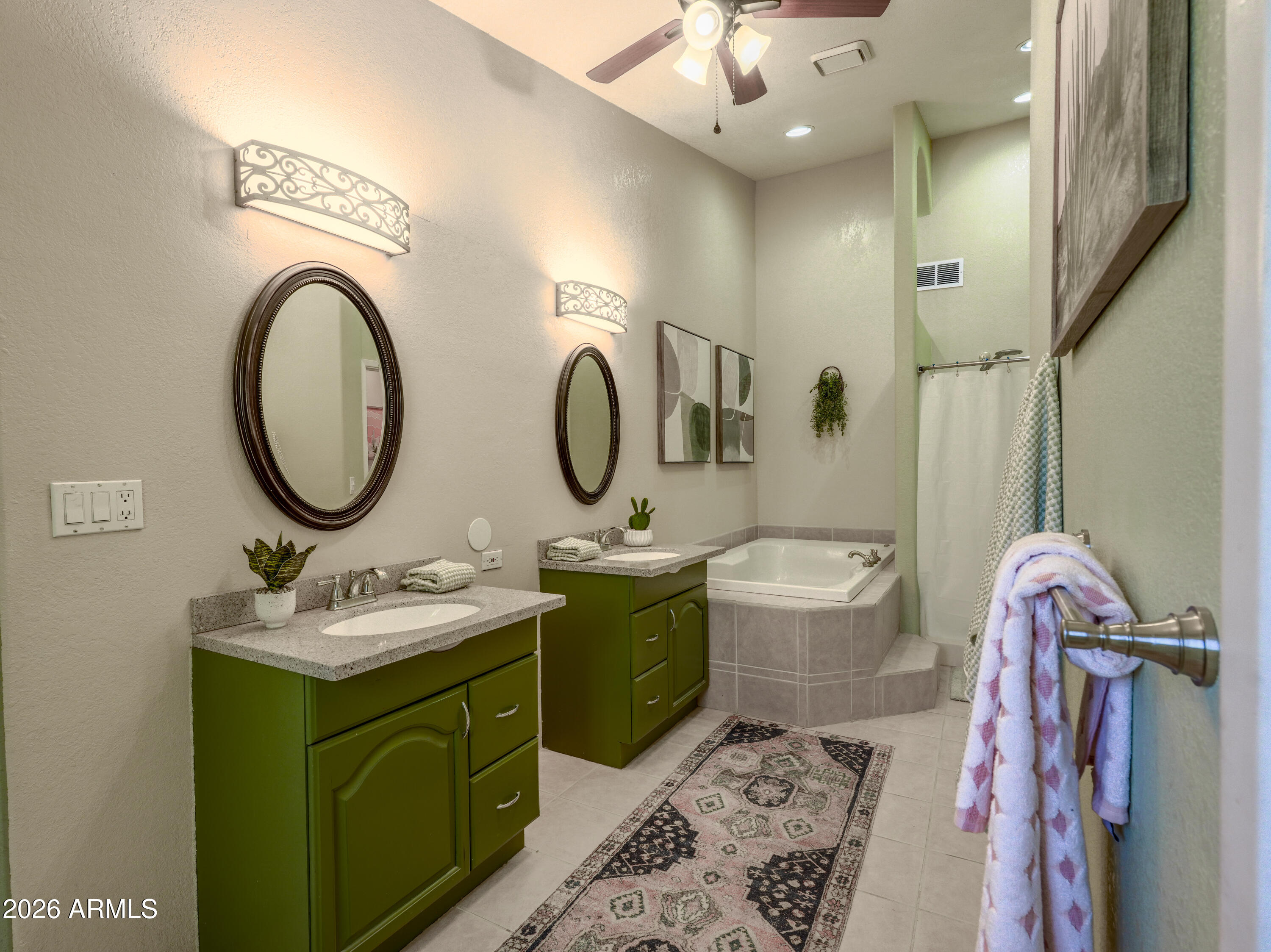 1224 North Acacia Road Apache Junction, AZ 85119 - Photo 23 of 48 a bathroom with a toilet sink and mirror
