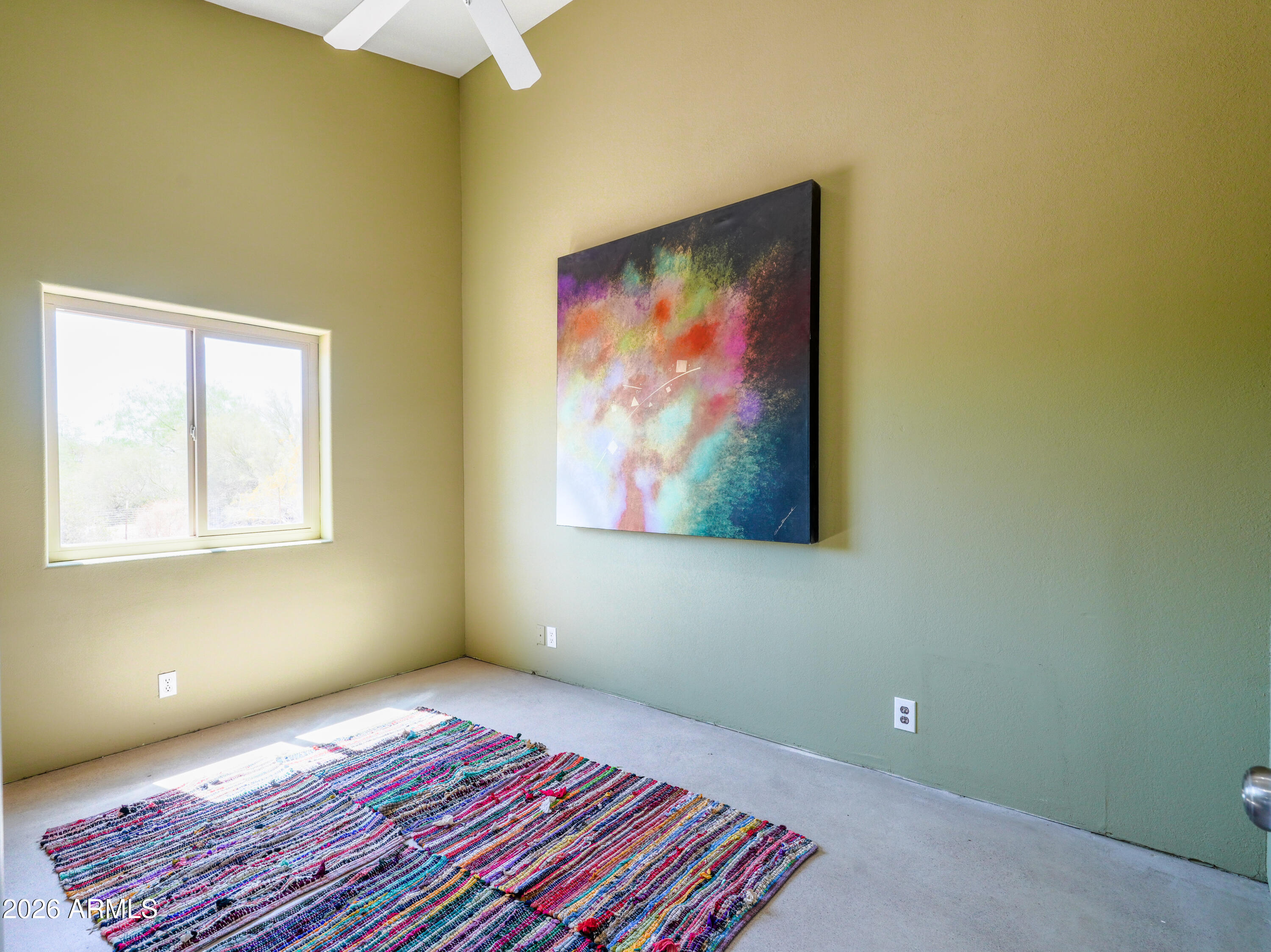 1224 North Acacia Road Apache Junction, AZ 85119 - Photo 30 of 48 a view of a room with wooden floor and windows
