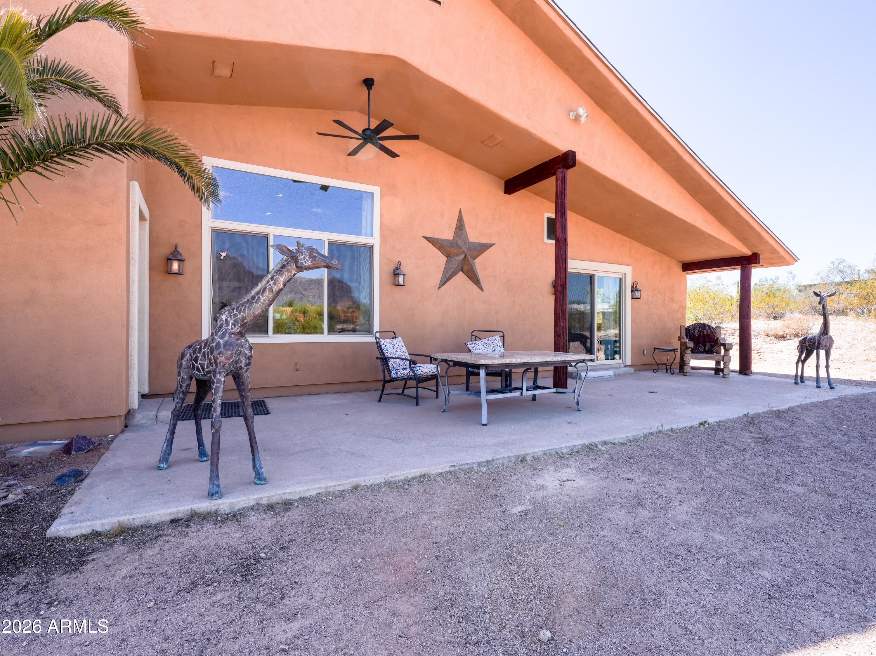 1224 North Acacia Road Apache Junction, AZ 85119 - Photo 38 of 48 a view of game room with windows and wooden floor