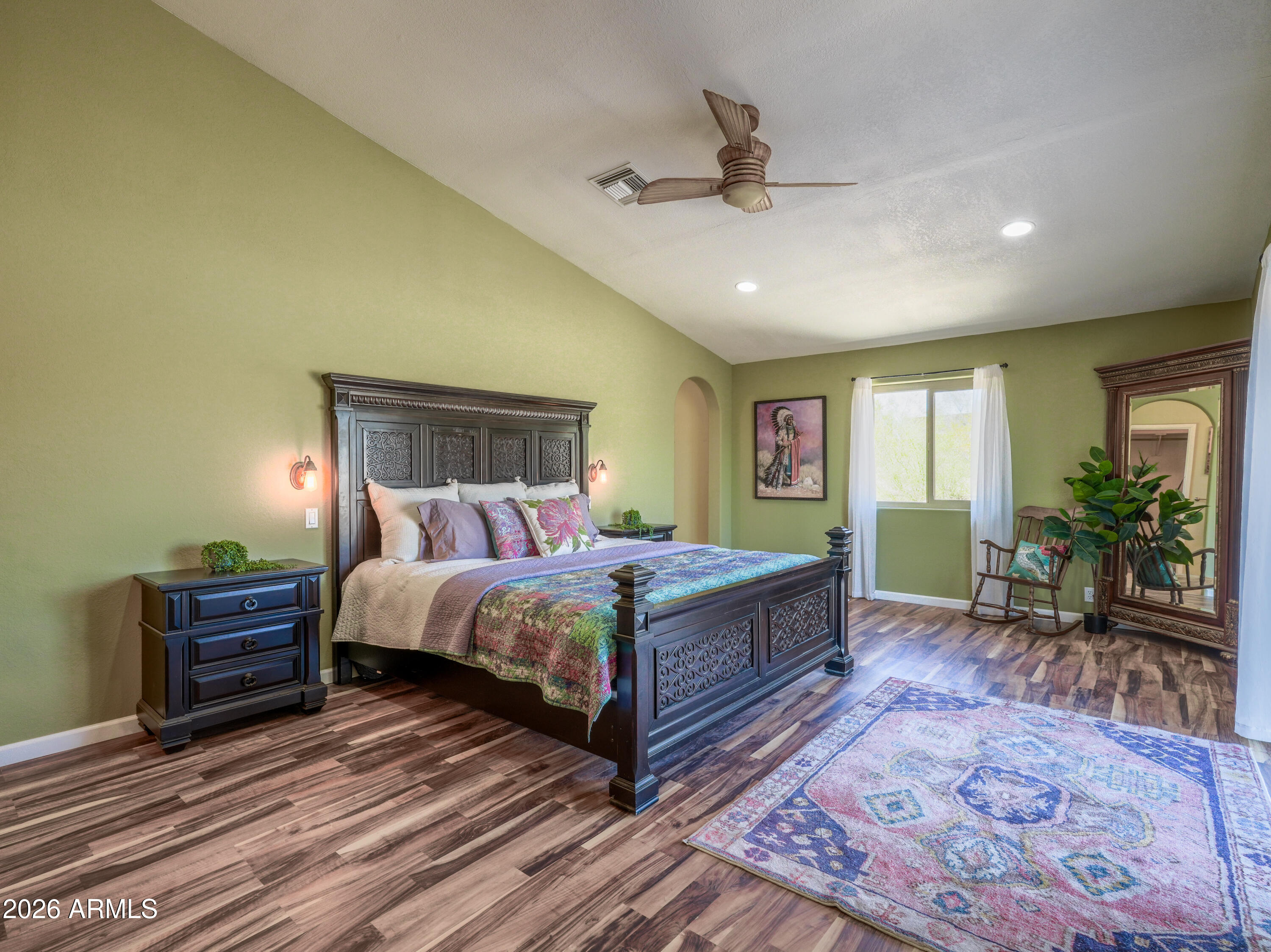 1224 North Acacia Road Apache Junction, AZ 85119 - Photo 7 of 48 a bed room with a bed and a chair