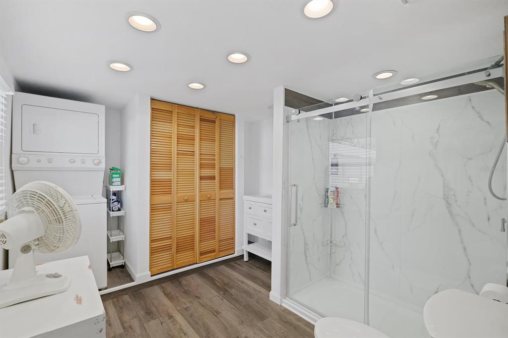 Undisclosed Address Holiday, FL 34691 - Photo 15 of 32 a bathroom with a shower and a tub