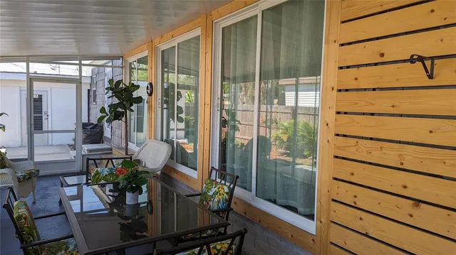 a view of balcony with potted plant