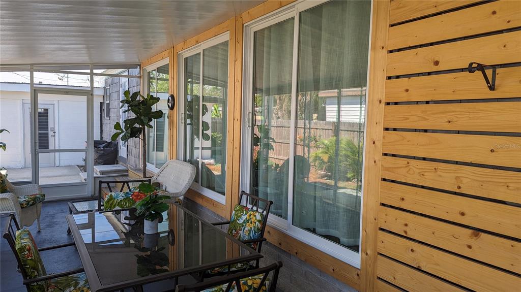 Undisclosed Address Holiday, FL 34691 - Photo 18 of 32 a view of balcony with potted plant