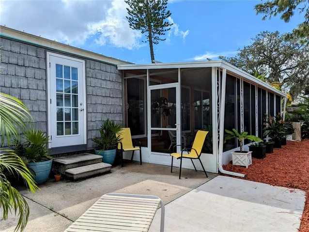 a view of a lounge chairs in the patio