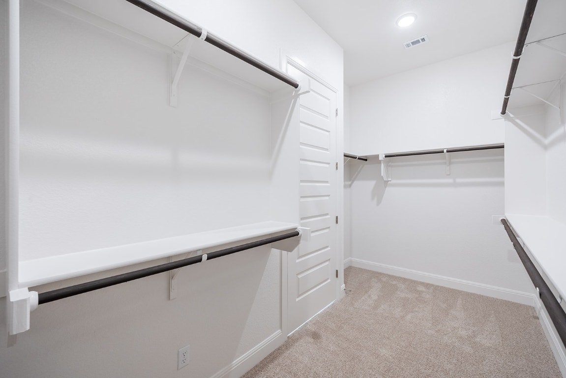 228 Running Fawn Georgetown, TX 78628 - Photo 12 of 29 a view of an empty walk in closet