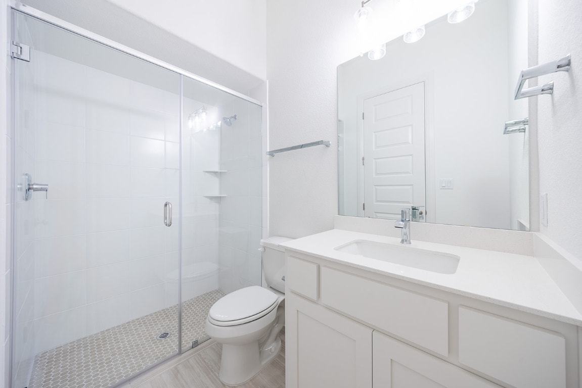 228 Running Fawn Georgetown, TX 78628 - Photo 15 of 29 a bathroom with a sink a toilet and shower
