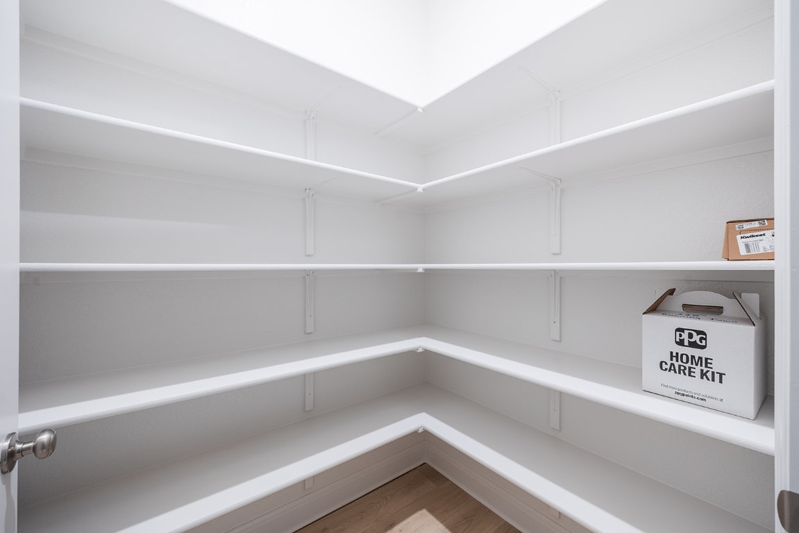228 Running Fawn Georgetown, TX 78628 - Photo 23 of 29 a view of walk in closet with empty racks