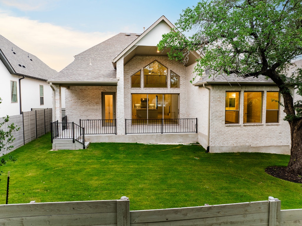 228 Running Fawn Georgetown, TX 78628 - Photo 26 of 29 a front view of house with yard and green space