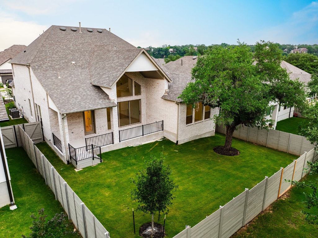 228 Running Fawn Georgetown, TX 78628 - Photo 27 of 29 a aerial view of a house next to a big yard and large trees