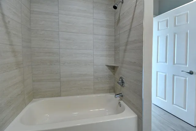 a hallway with cabinets