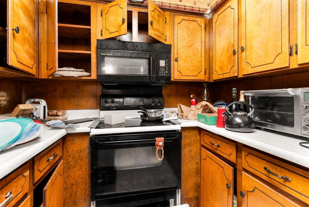 3024 Conflans Road, Unit 3026 Irving, TX 75061 - Photo 11 of 29 a kitchen with a sink cabinets and appliances