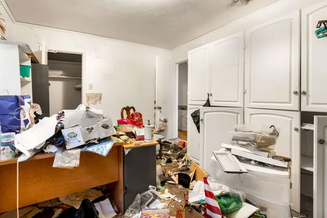 a room with furniture and a window