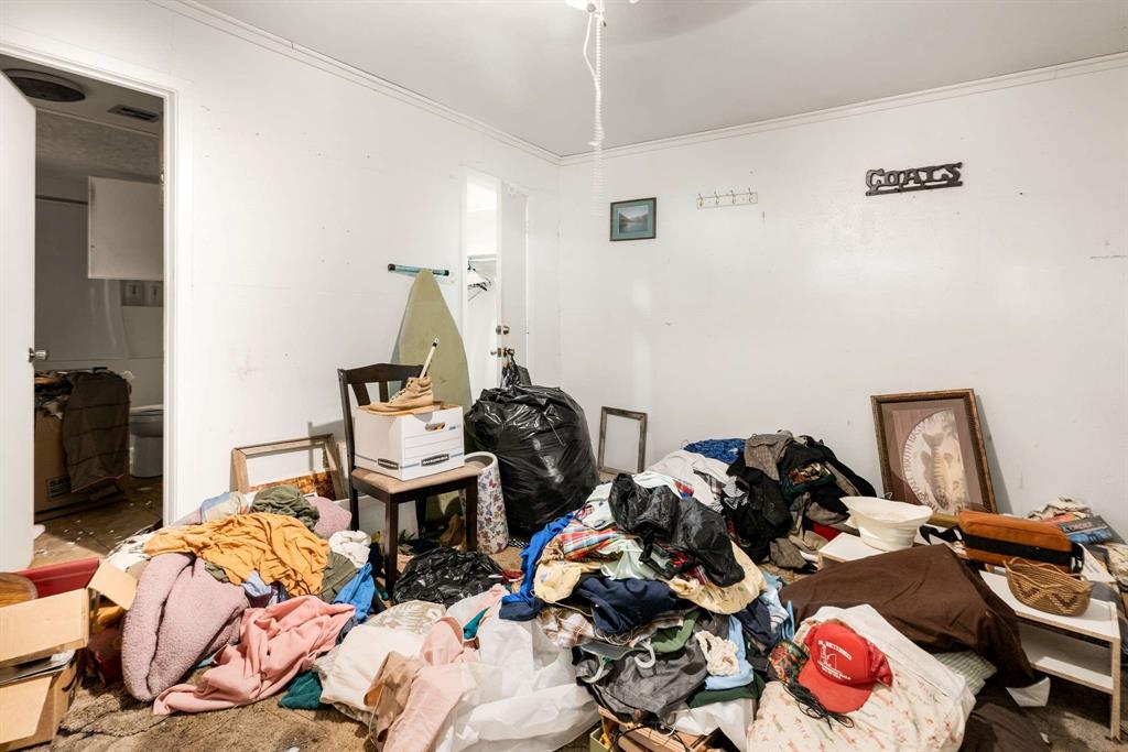 3024 Conflans Road, Unit 3026 Irving, TX 75061 - Photo 16 of 29 a bedroom with two beds and a couch