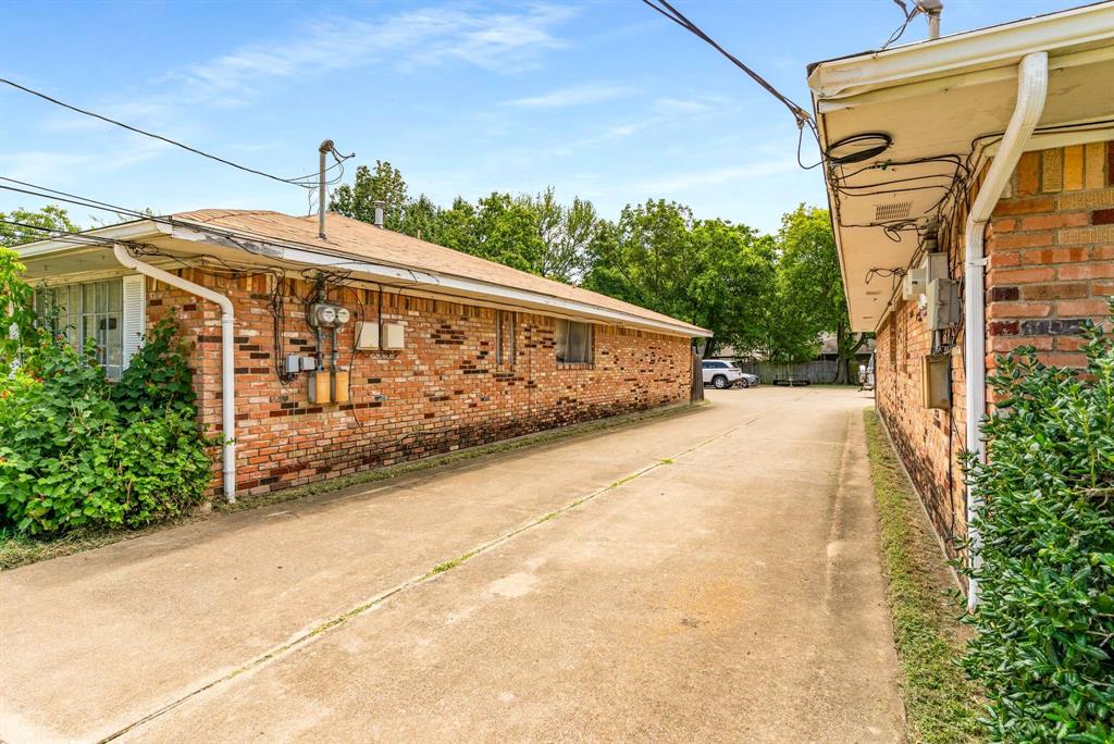 3024 Conflans Road, Unit 3026 Irving, TX 75061 - Photo 21 of 29 a view of a building with a street