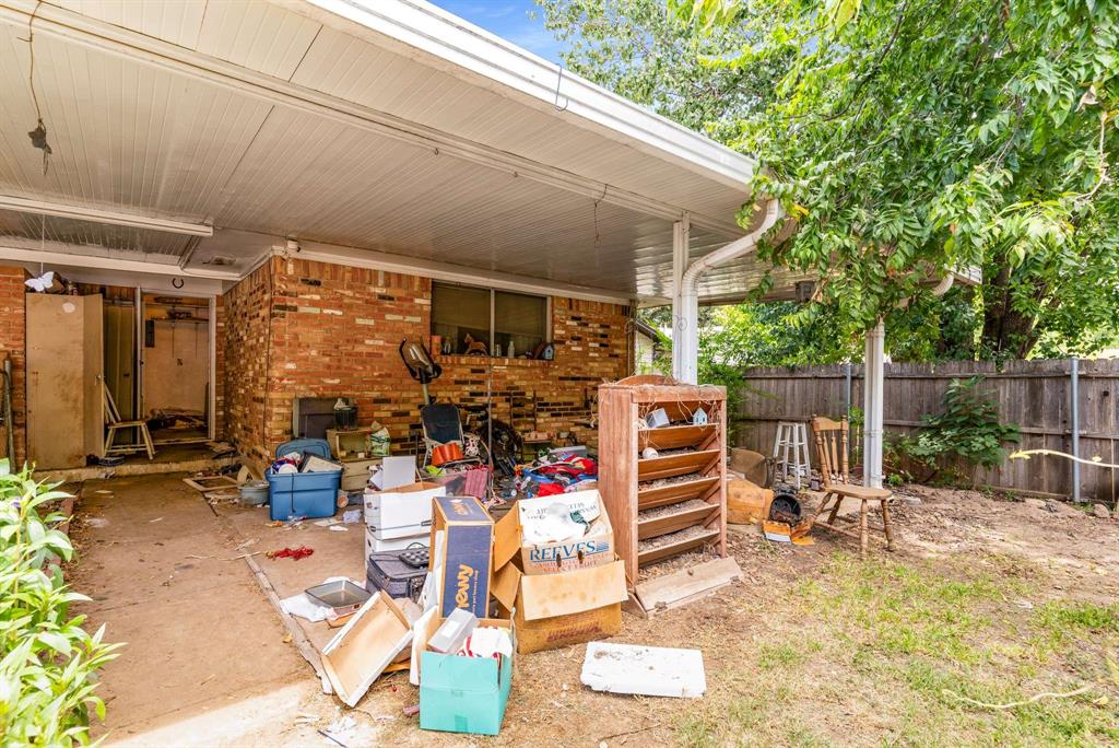 3024 Conflans Road, Unit 3026 Irving, TX 75061 - Photo 24 of 29 a view of a chairs and tables in patio