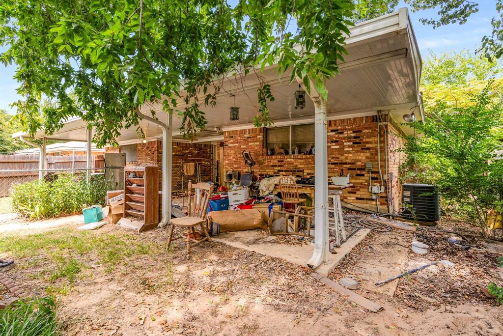3024 Conflans Road, Unit 3026 Irving, TX 75061 - Photo 25 of 29 a view of outdoor space yard and patio