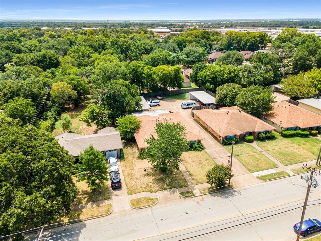 3024 Conflans Road, Unit 3026 Irving, TX 75061 - Photo 29 of 29 an aerial view of residential houses with outdoor space