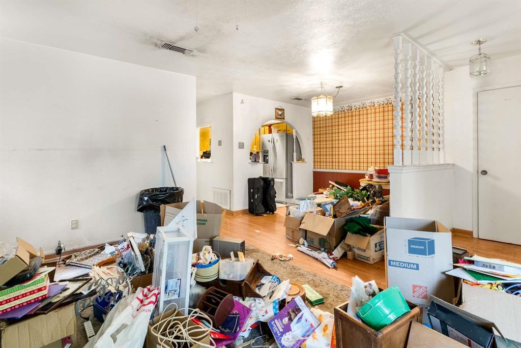 3024 Conflans Road, Unit 3026 Irving, TX 75061 - Photo 7 of 29 a room with furniture toys and a chandelier