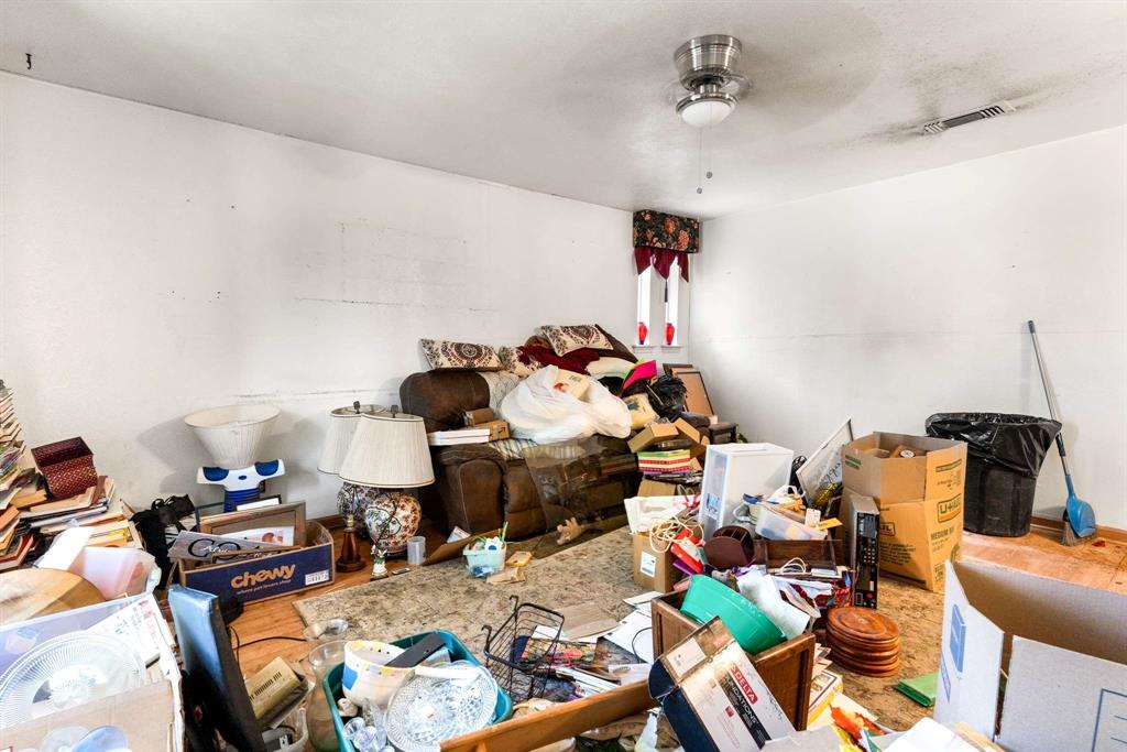 3024 Conflans Road, Unit 3026 Irving, TX 75061 - Photo 8 of 29 a living room with furniture and a table