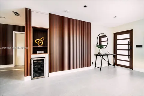 a view of a livingroom with furniture and window