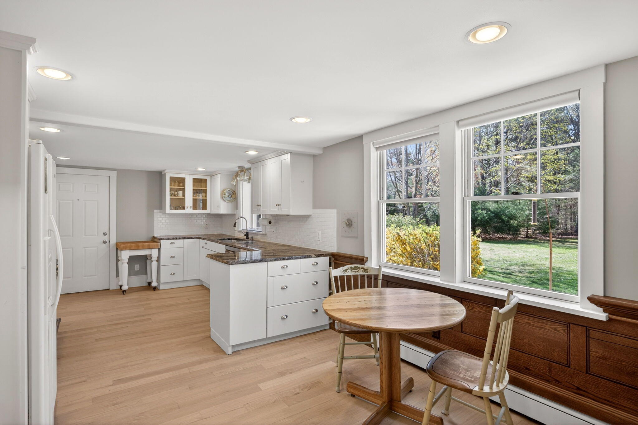 69 County Road Bourne, MA 02532 - Photo 14 of 54 a kitchen with stainless steel appliances granite countertop a stove a sink and a refrigerator