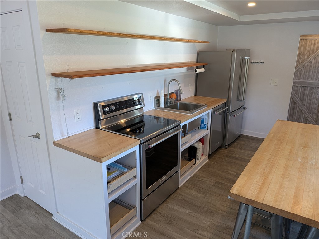 4020 F Street Eureka, CA 95503 - Photo 3 of 15 a kitchen with a stove and a refrigerator