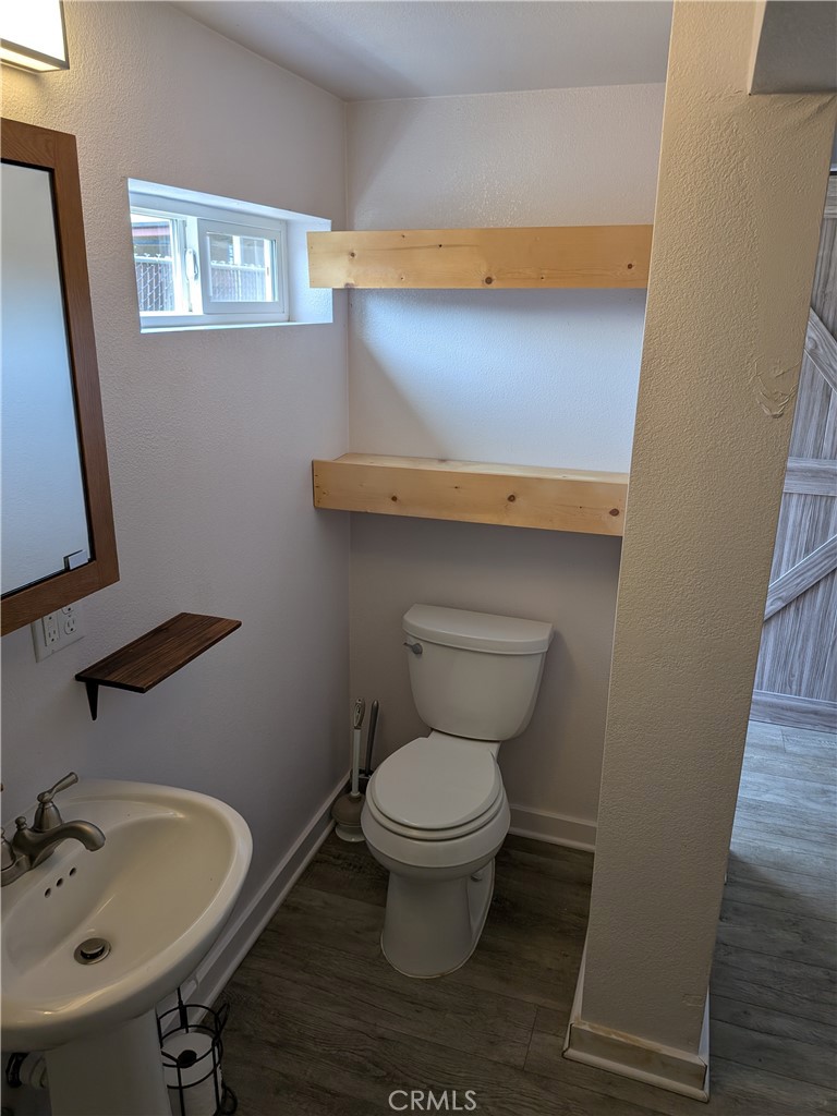 4020 F Street Eureka, CA 95503 - Photo 7 of 15 a bathroom with a sink and a toilet