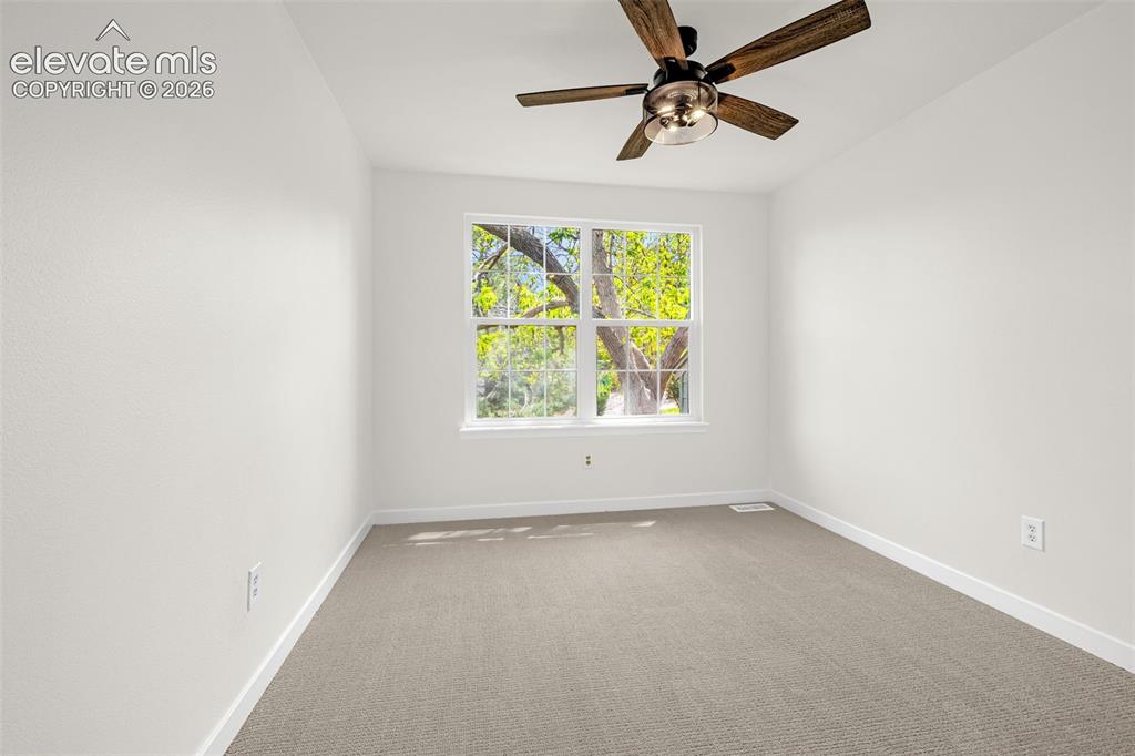 17396 East Rice Circle, Unit D Aurora, CO 80015 - Photo 21 of 48 Upper Level Bedroom