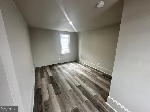 a view of wooden floor and staircase