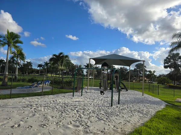a view of park with swings