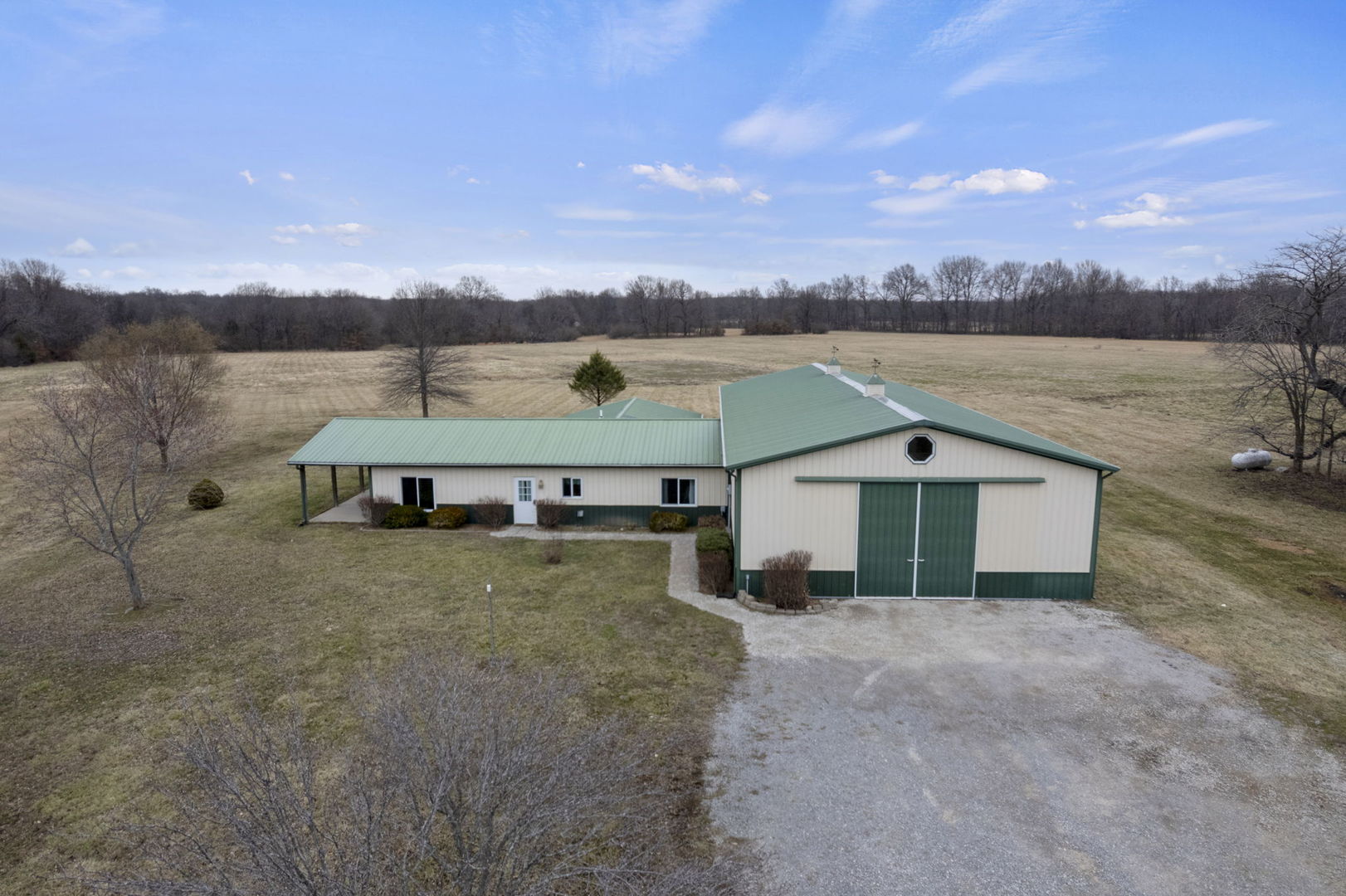7198 Omega Road Kinmundy, IL 62854 - Photo 12 of 95 a view of a house with big yard and large tree