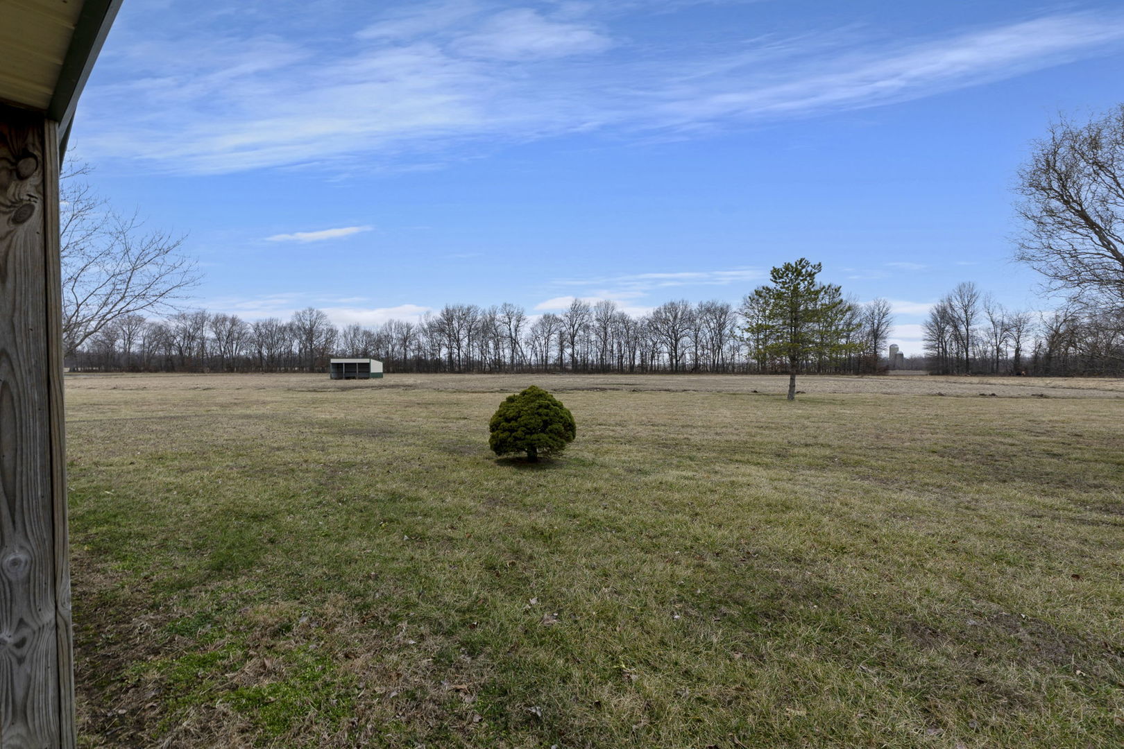 7198 Omega Road Kinmundy, IL 62854 - Photo 20 of 95 a view of a lake with houses in the back