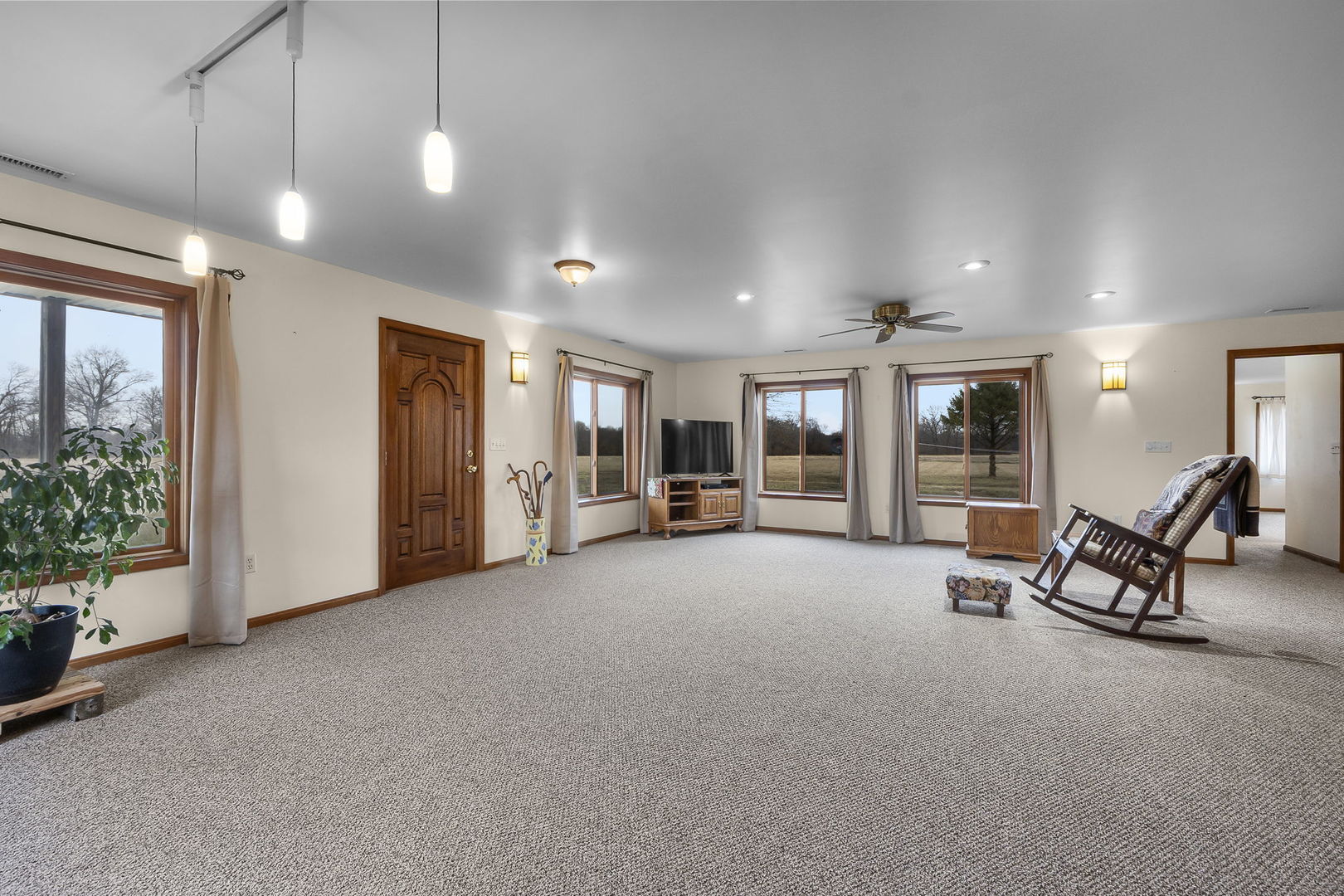 7198 Omega Road Kinmundy, IL 62854 - Photo 27 of 95 a living room with furniture and a large window
