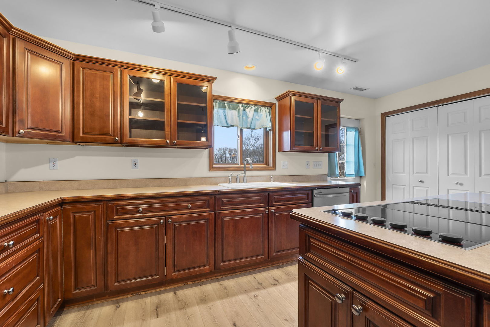 7198 Omega Road Kinmundy, IL 62854 - Photo 29 of 95 a kitchen with stainless steel appliances granite countertop a sink and cabinets