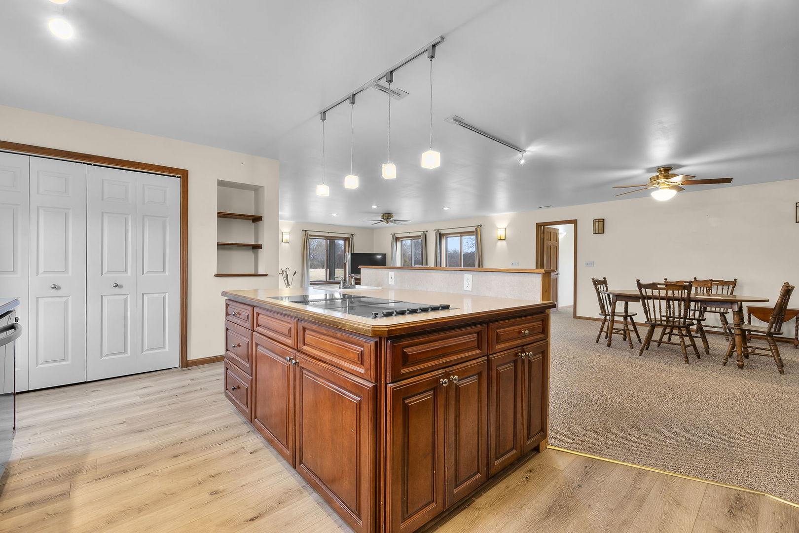 7198 Omega Road Kinmundy, IL 62854 - Photo 31 of 95 a kitchen with stainless steel appliances granite countertop a stove and a wooden cabinets