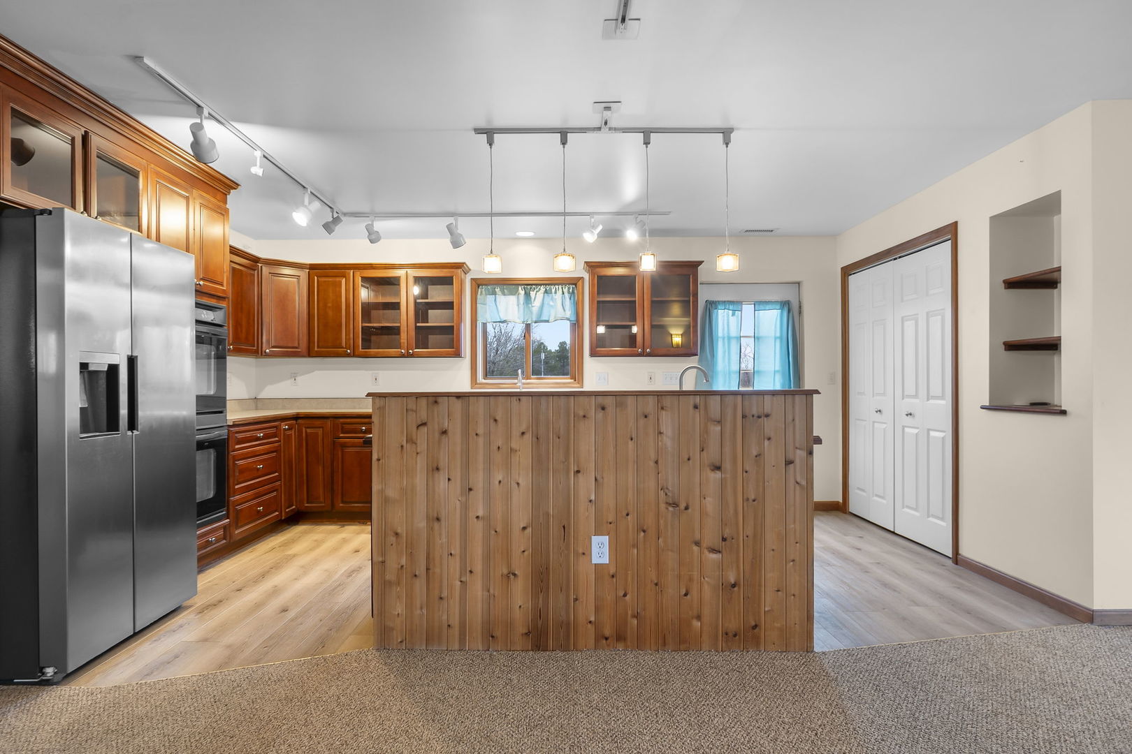 7198 Omega Road Kinmundy, IL 62854 - Photo 32 of 95 a kitchen with stainless steel appliances kitchen island granite countertop a refrigerator and cabinets