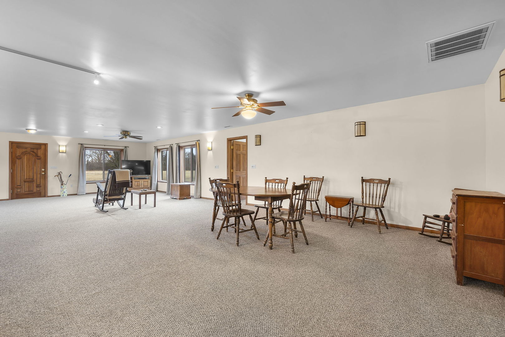 7198 Omega Road Kinmundy, IL 62854 - Photo 34 of 95 a view of a dining room with furniture and a table