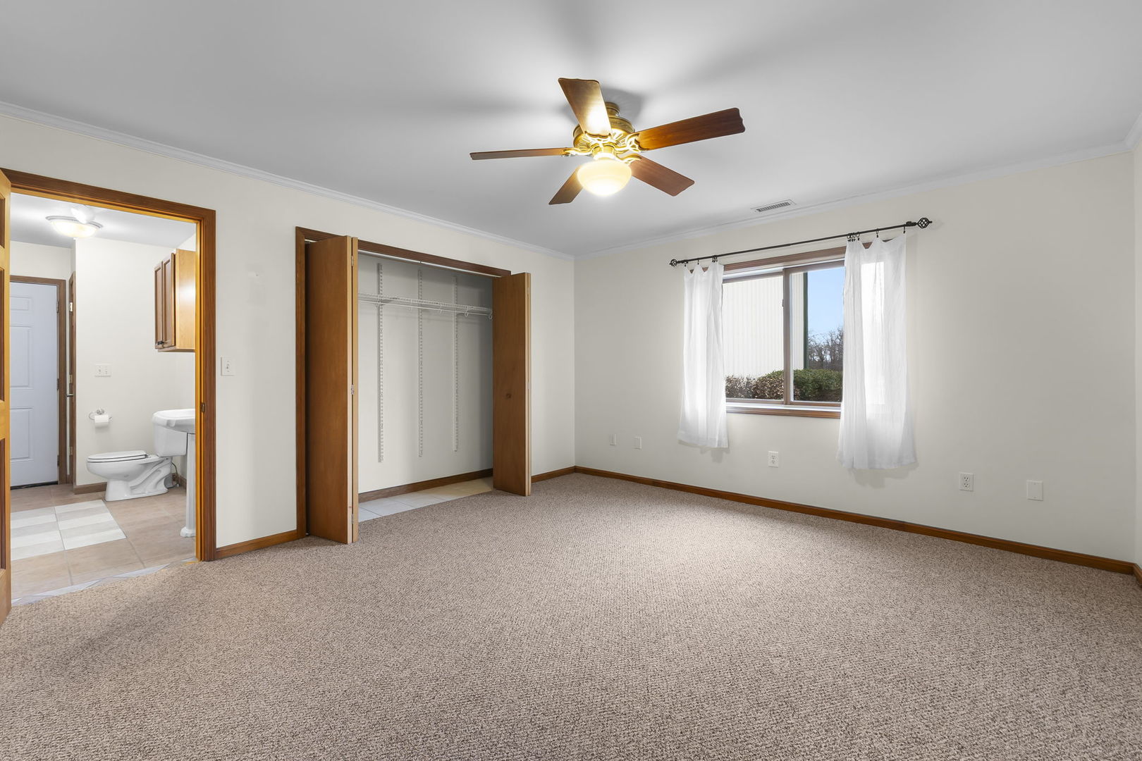 7198 Omega Road Kinmundy, IL 62854 - Photo 42 of 95 an empty room with windows and fan