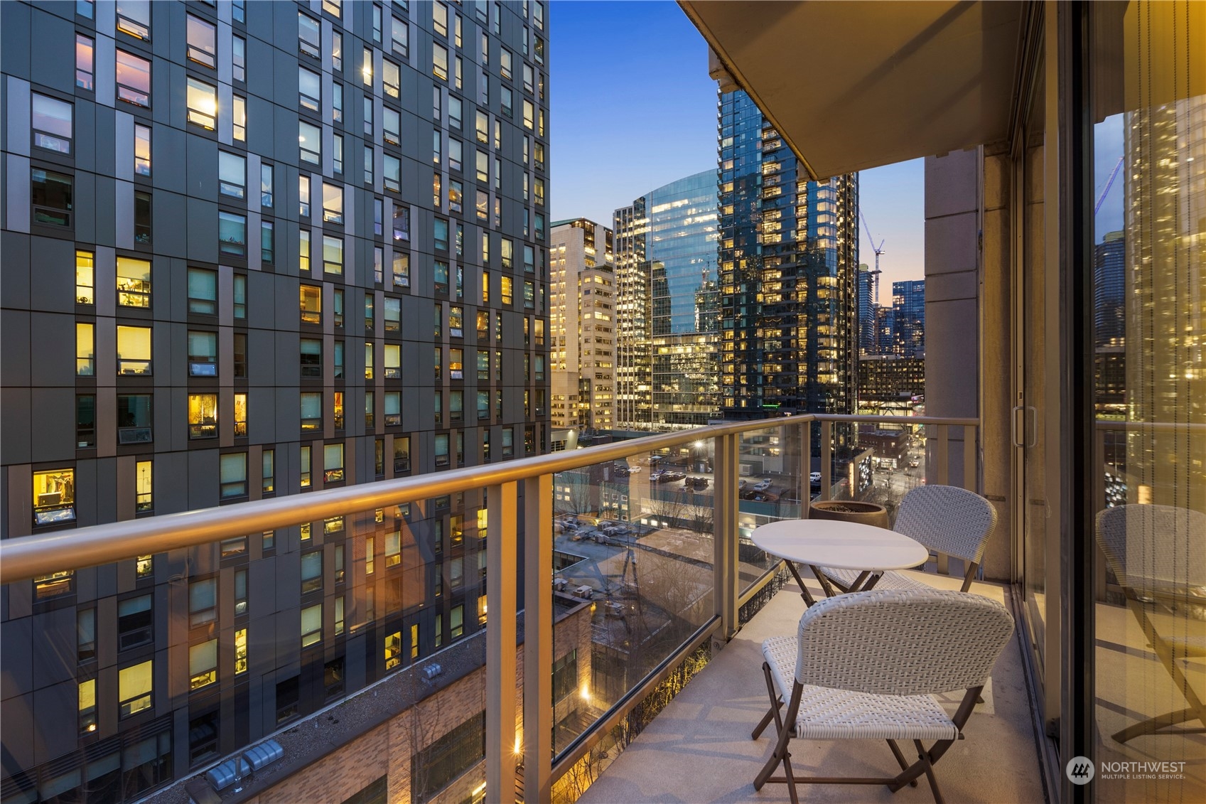 910 Lenora Street, Unit S1003 Seattle, WA 98121 - Photo 19 of 28 a view of a balcony with chairs
